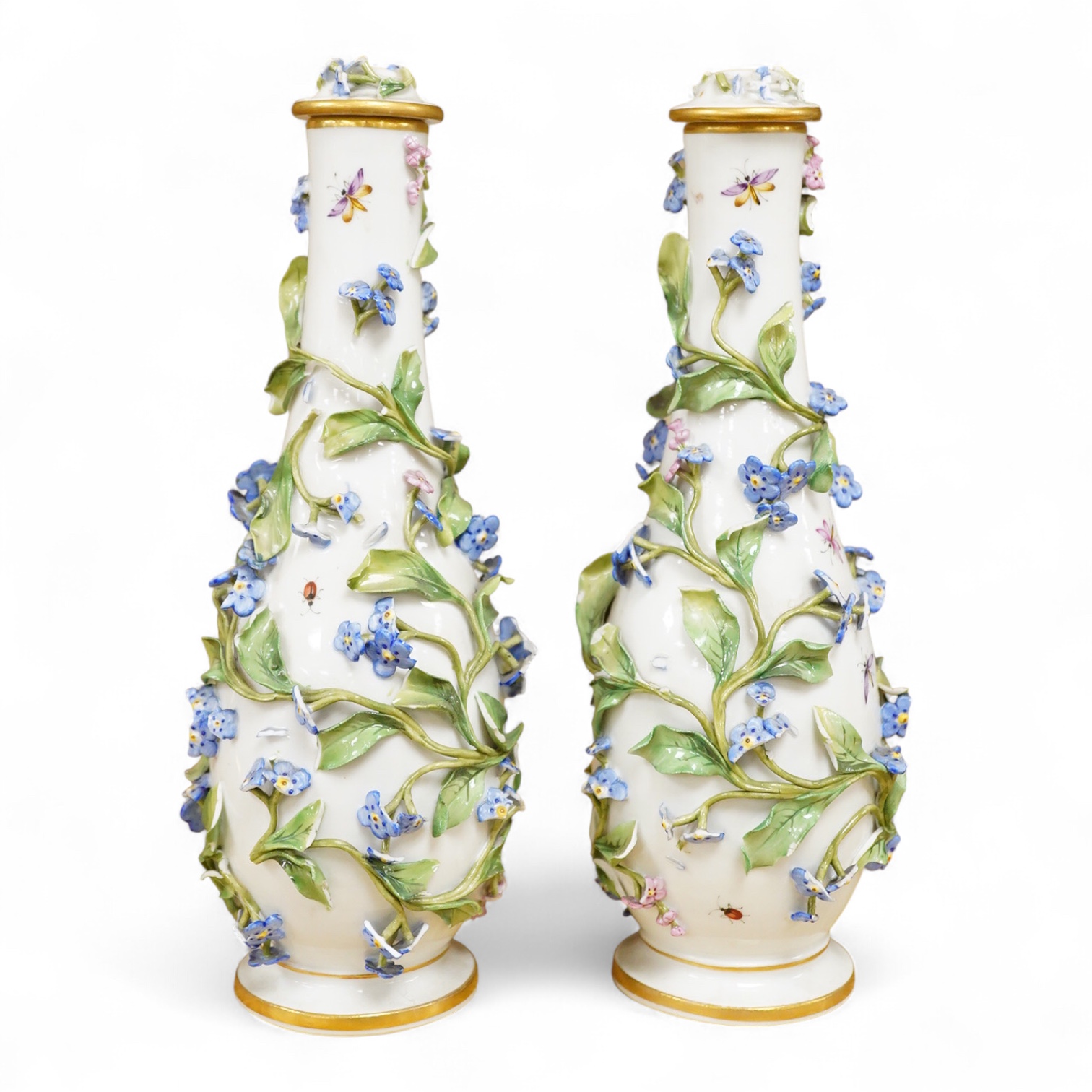 A pair of late 19th century Meissen flower encrusted vases and covers, 20cm high